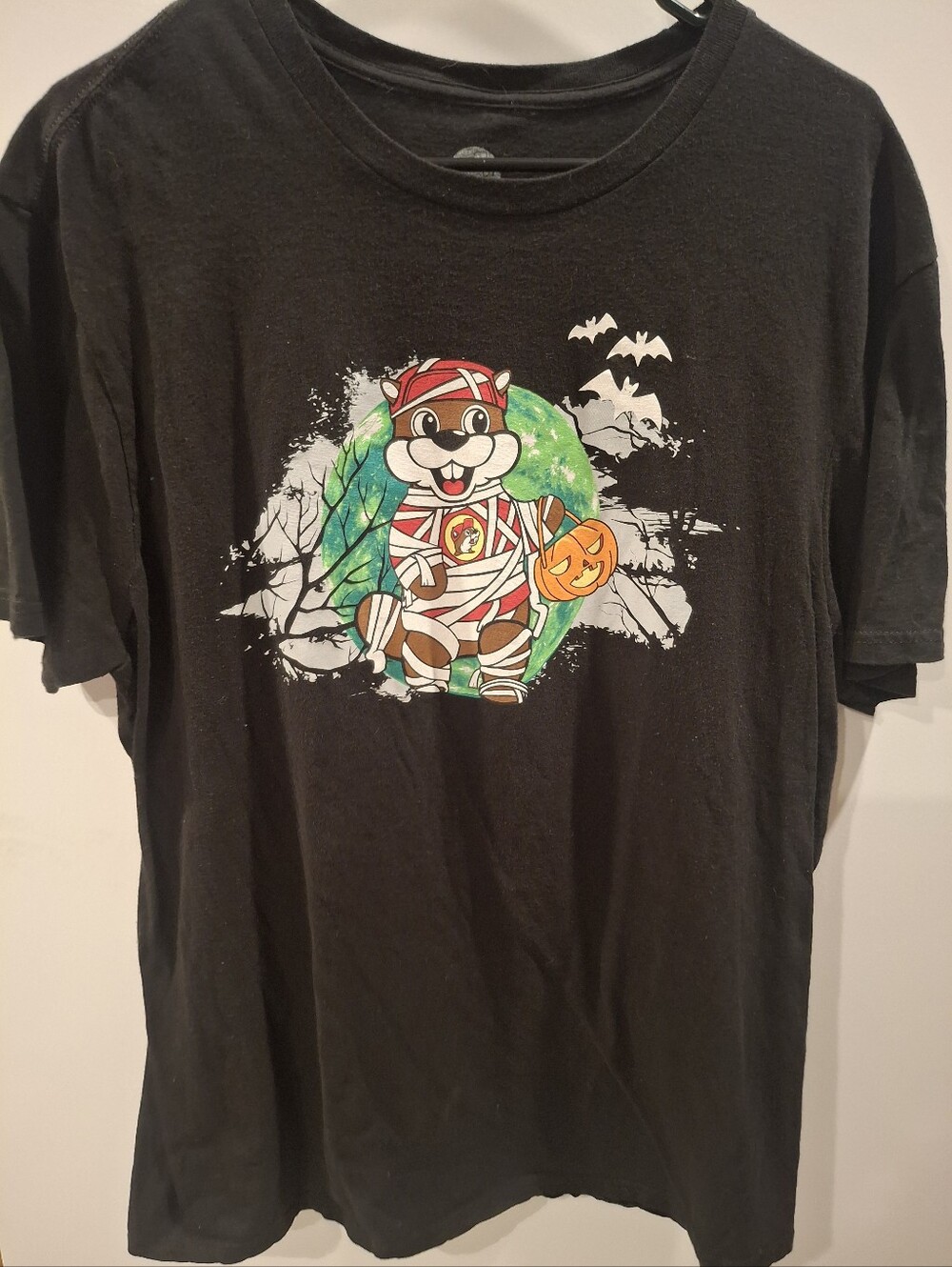 Black Halloween Graphic Tee with Buc-cee Pumpkin Design